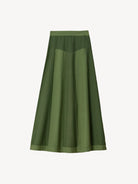 Green skirt on a light background
