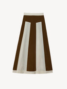 Skirt with brown and white vertical stripes on a light pink background