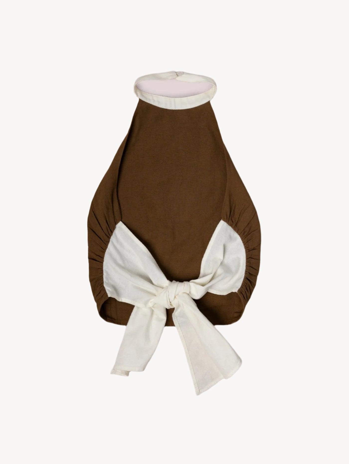 Brown bikini top with a white bow on a light background