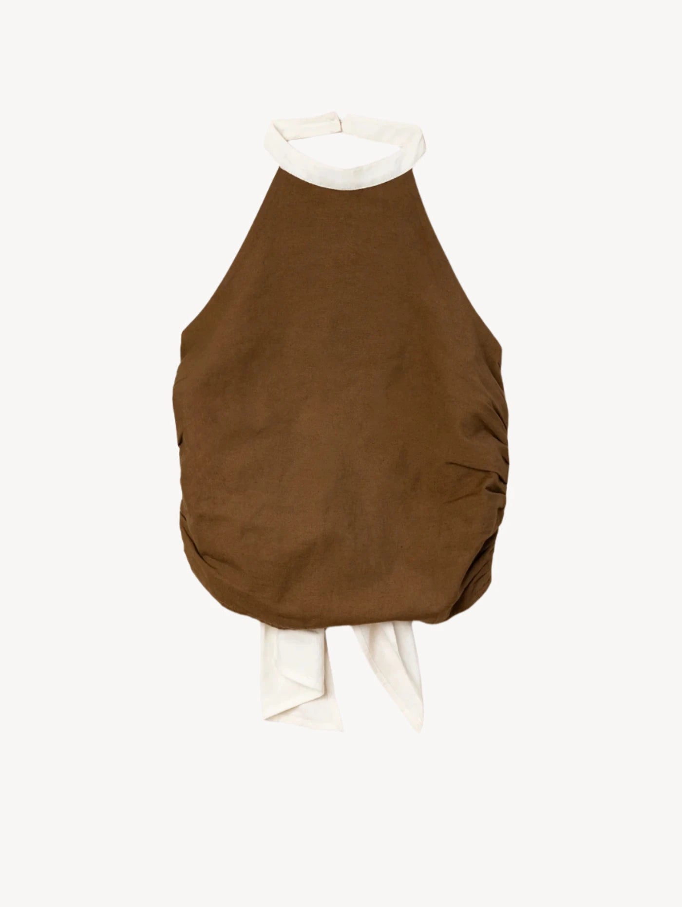 Brown halter top with white trim on a light pink background